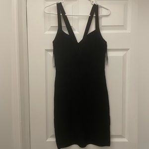 BEBE mini bandage dress with keyhole. Size small, black.